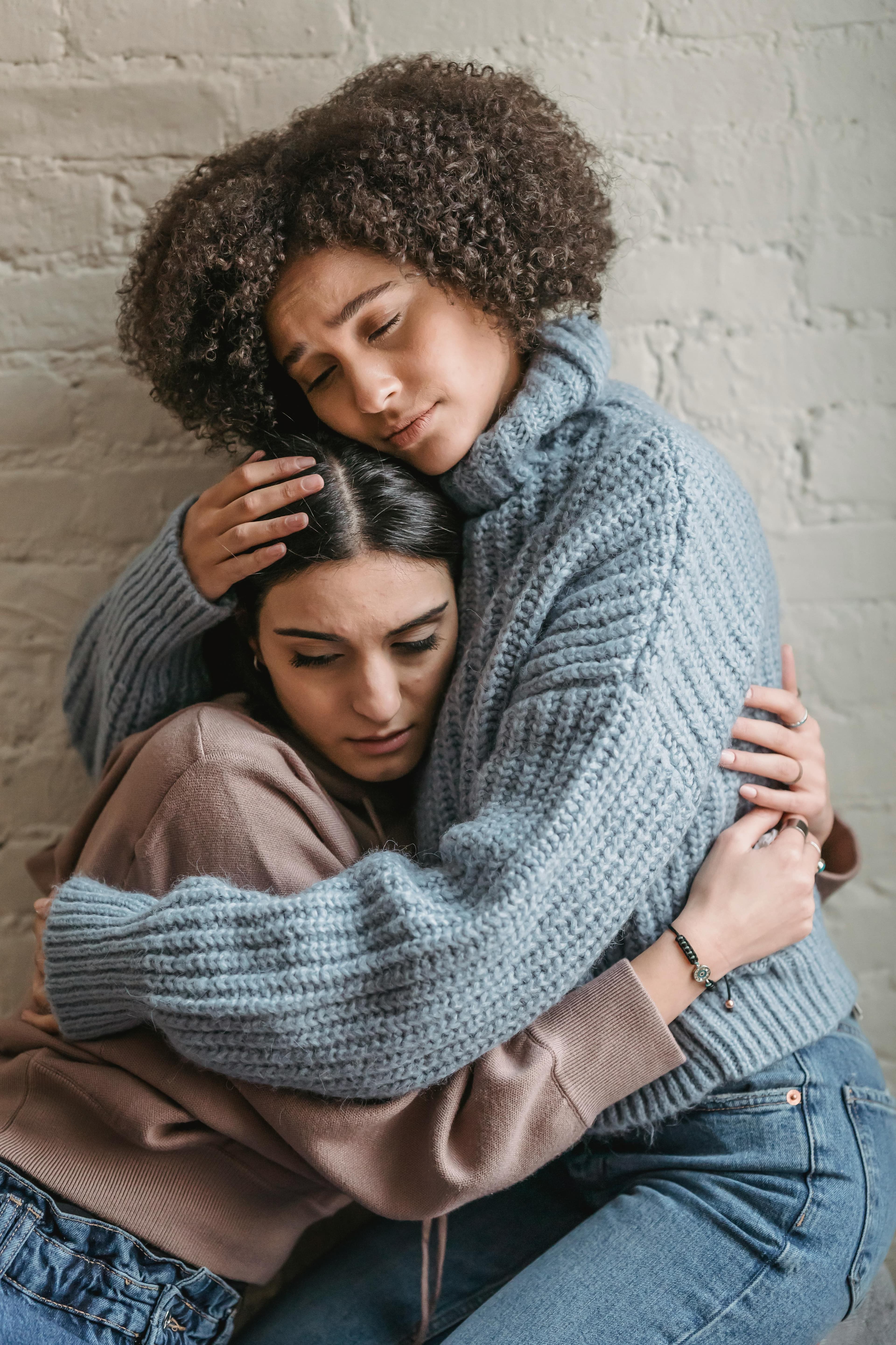 Hands reaching out in a gesture of connection and support